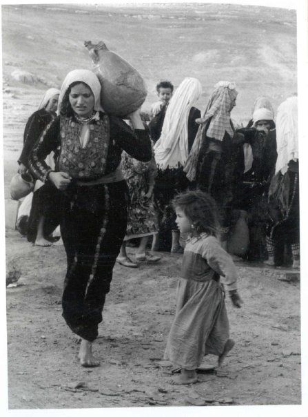 Palestinian woman and child fleeing the persecution and massacres of their villages during the 1948 Nakba by Jewish terrorist groups in Palestine
