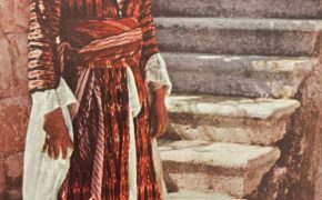 A Young Palestinian Girl Stands On Some Stairs In Nazareth, Palestine Wearing A Traditional Palestinain Thob. Sew To Speak